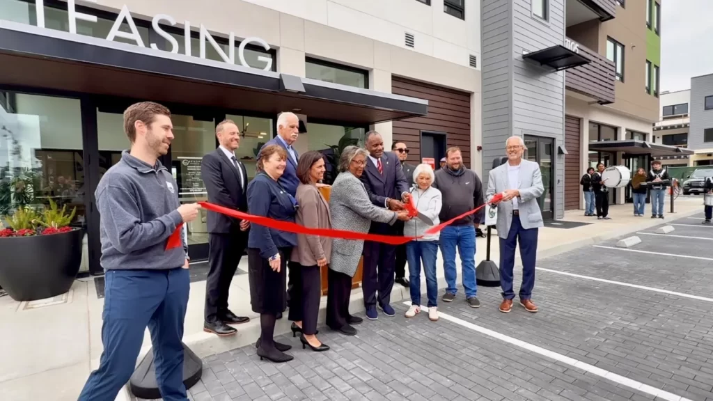 Seaside celebration ribbon cutting